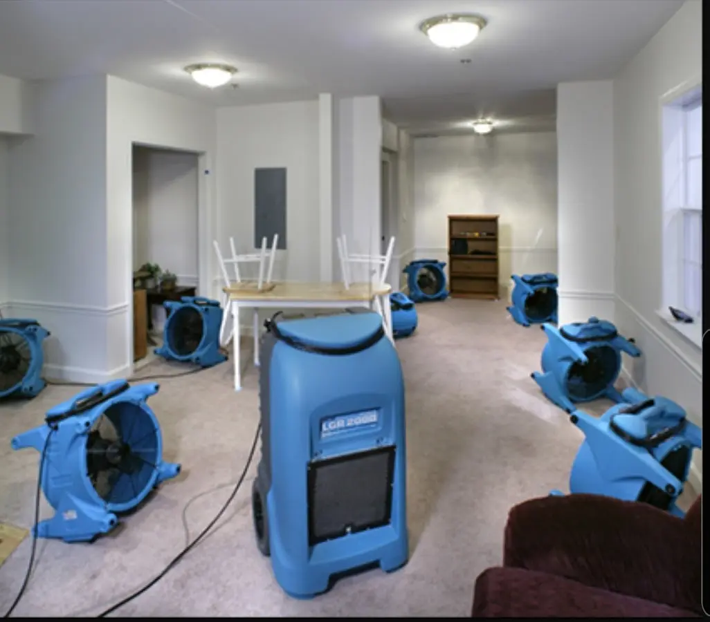 Air movers and dehumidifier setup for Water Damage Restoration in Denair